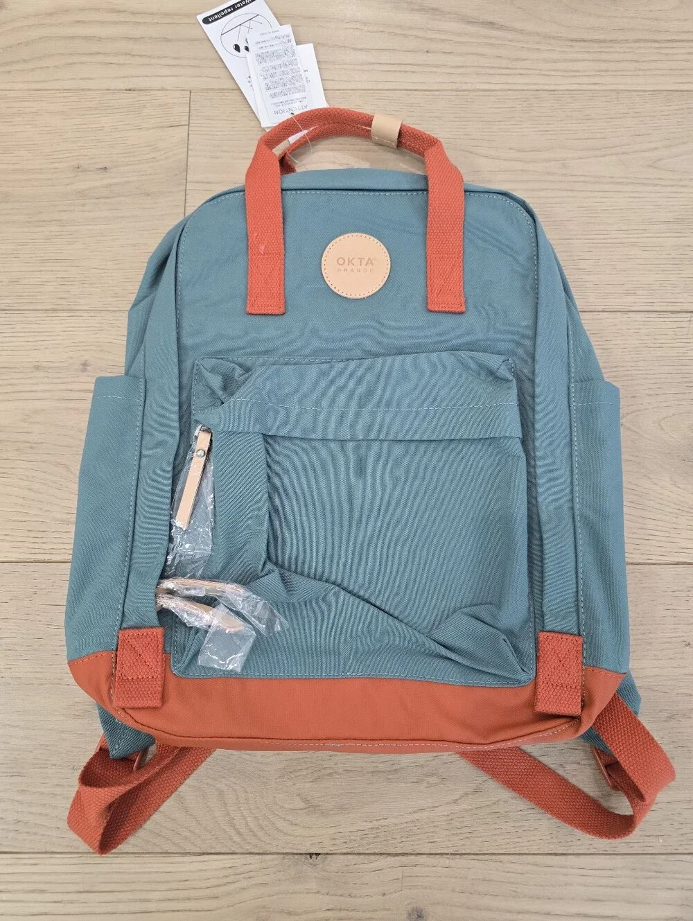 New Teal and Orange Waterproof Backpack
